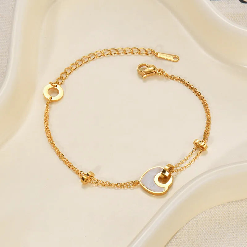 Women's stainless steel and resin bracelet with a double-layer loving heart design.