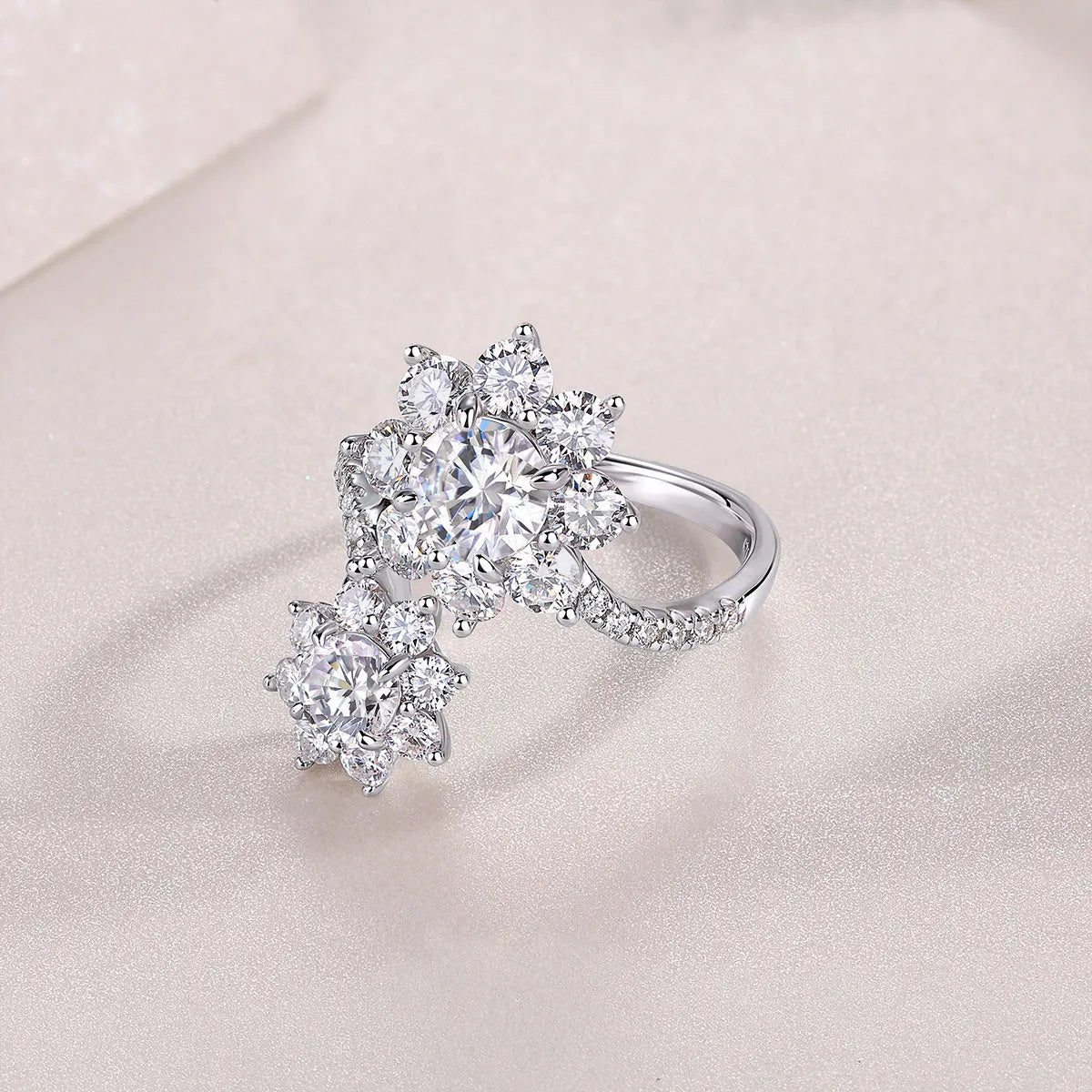 1 carat moissanite wedding ring set in S925 silver with platinum plating on a white background with gift box