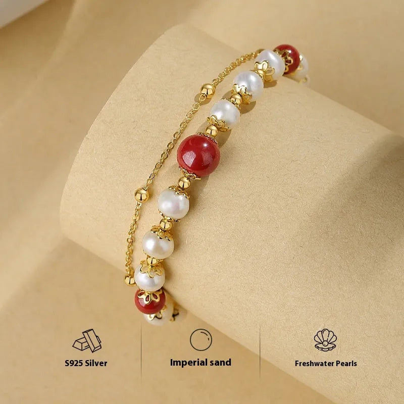 Sterling silver double-layer bracelet with freshwater pearls and red bean charms