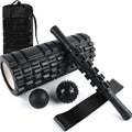Black 33cm gear-textured foam massage roller on a white background.