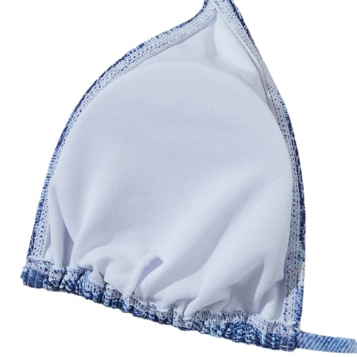 Denim blue printed bikini top and bottom set for women on a mannequin.