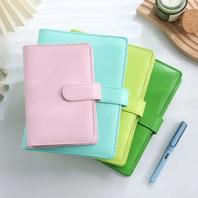 Solid colour A5 PU leather zippered loose-leaf binder notebook shell on a desk