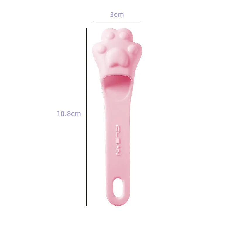 Silicone finger toothbrush for pets in pink, purple, and yellow colours