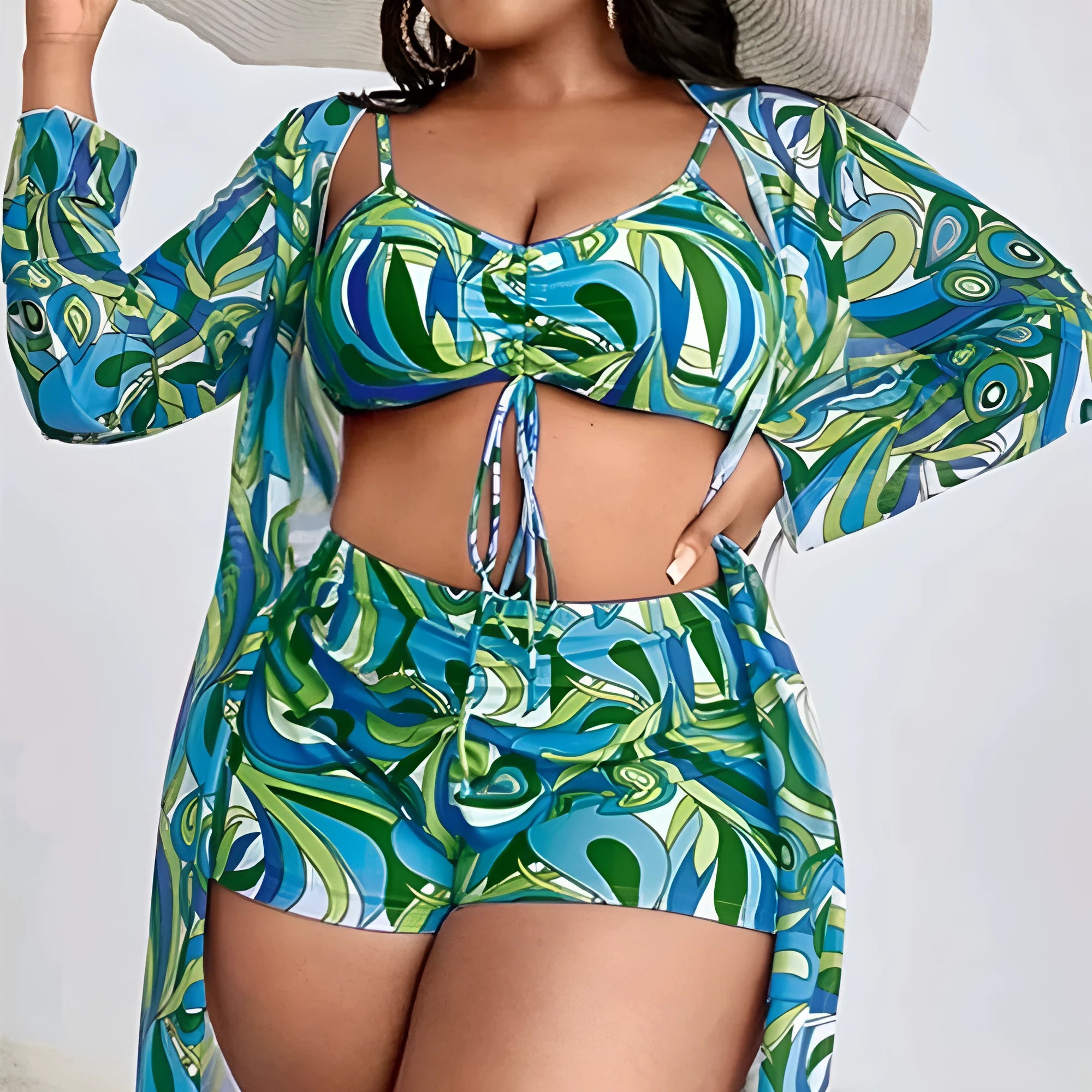 Women's floral print swimsuit three-piece set showing bra, shorts, and matching cardigan