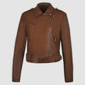 Women's black PU leather biker jacket with lapel collar and an adjustable waist belt on a hanger.