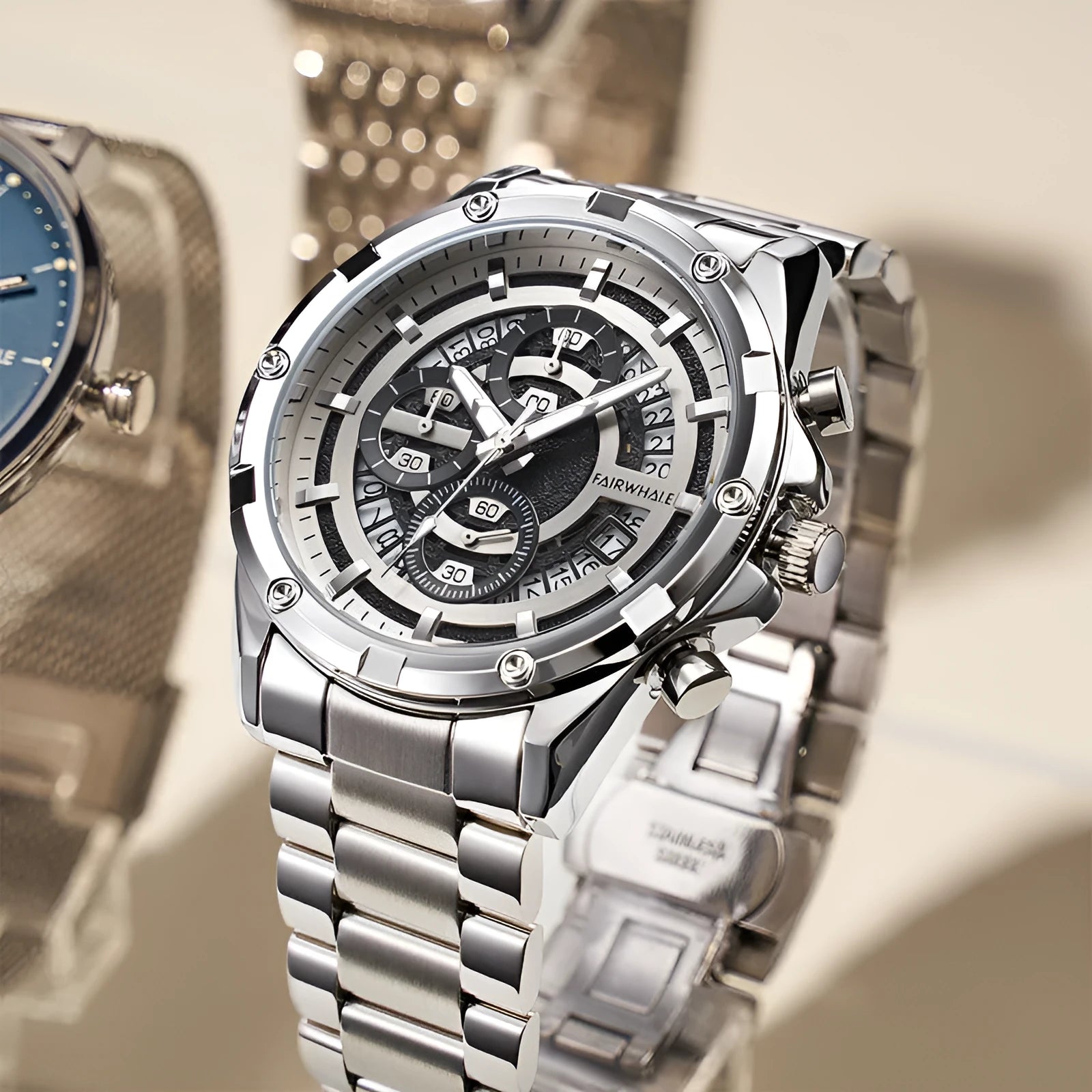 Men's waterproof quartz watch with luminous hands and stainless steel band in three colour variations.
