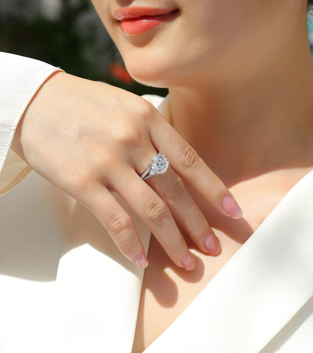 5-carat moissanite wedding ring in S925 silver with gold plating on white background