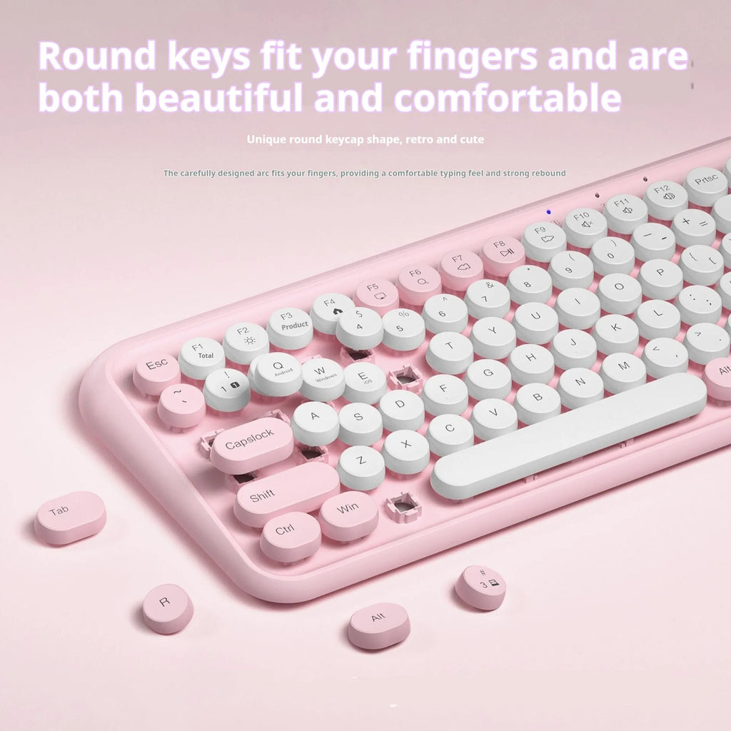 Pink Bluetooth keyboard with 84 quiet mechanical keys in compact wireless design