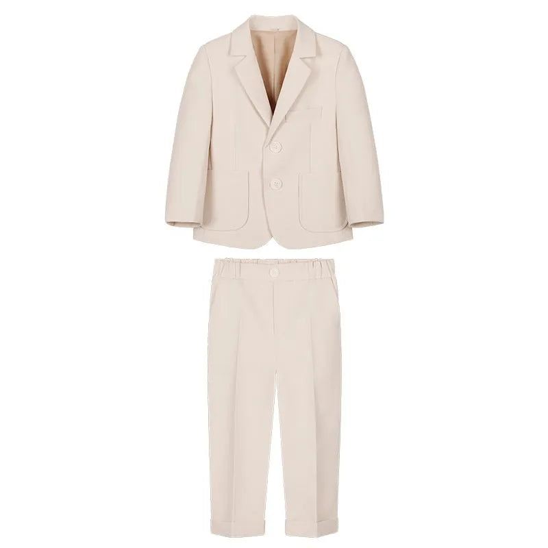 Boy's solid colour British style suit dress set with coat, trousers, vest, bow tie, and brooch on a hanger