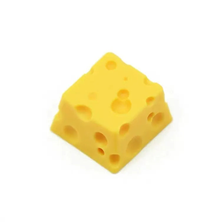 Yellow solid resin cheese wedge keycap for MX mechanical keyboards.