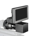 Digital night vision monocular with LED display showing enhanced night scene