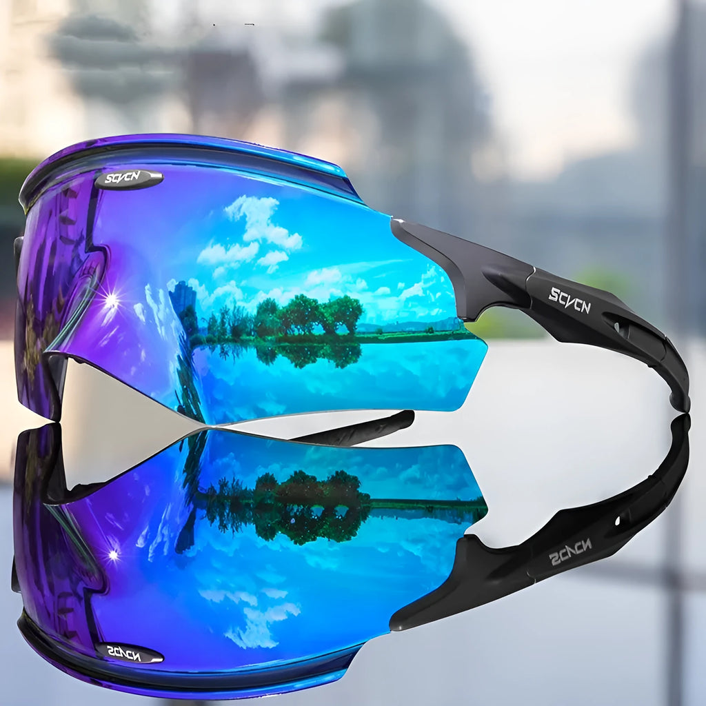 Frameless integrated lens athletic sports goggles in a colourful style on a solid background.
