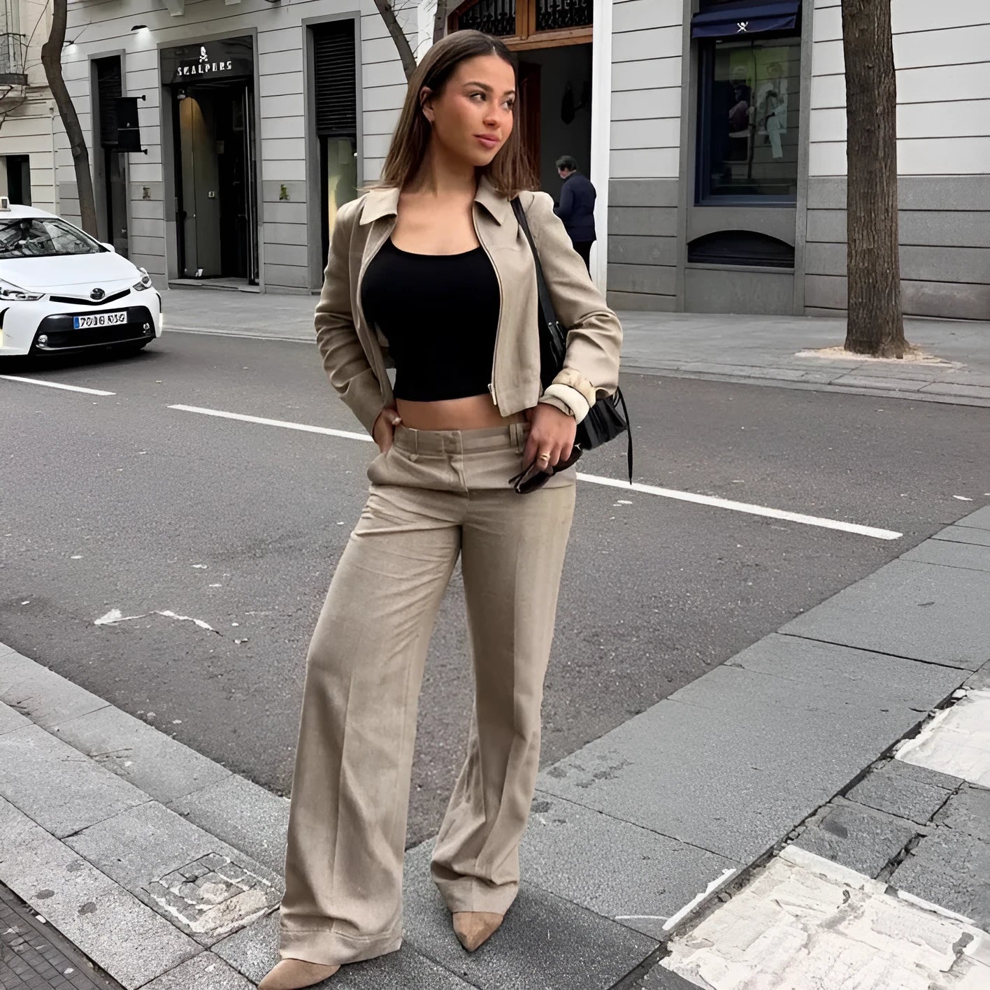 Women's herringbone pattern suit set with 3D embroidery detailing showing jacket and trousers