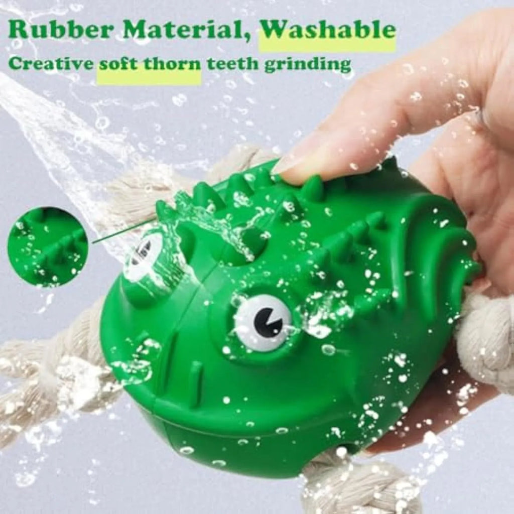 Green indestructible rubber toad dog toy with cotton rope legs and black button eyes, for aggressive chewers