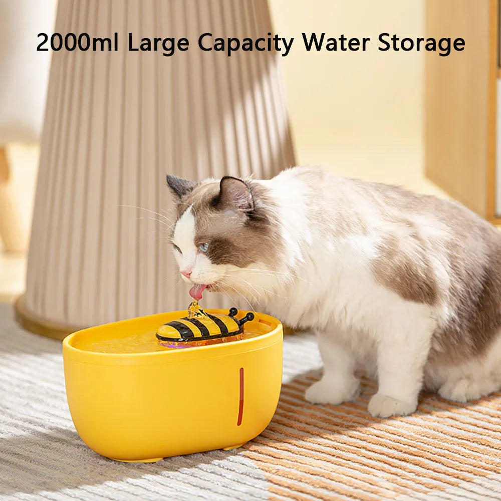 Yellow cat water fountain with filtration system, water pump, observation window, and anti-slip base