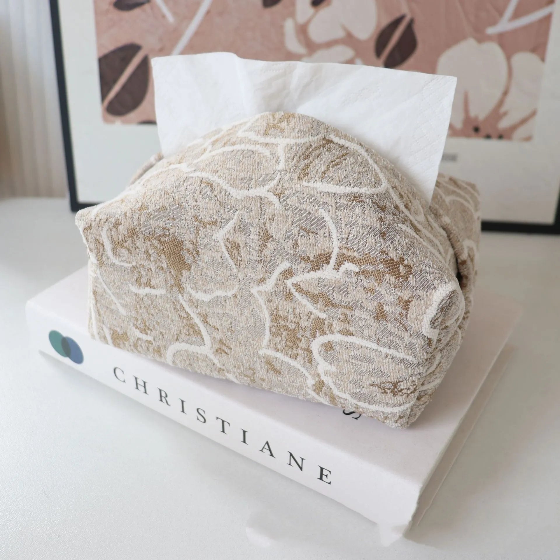 Pastoral style cotton fabric tissue box cover in beige, blue, and brown colours on a tea table.