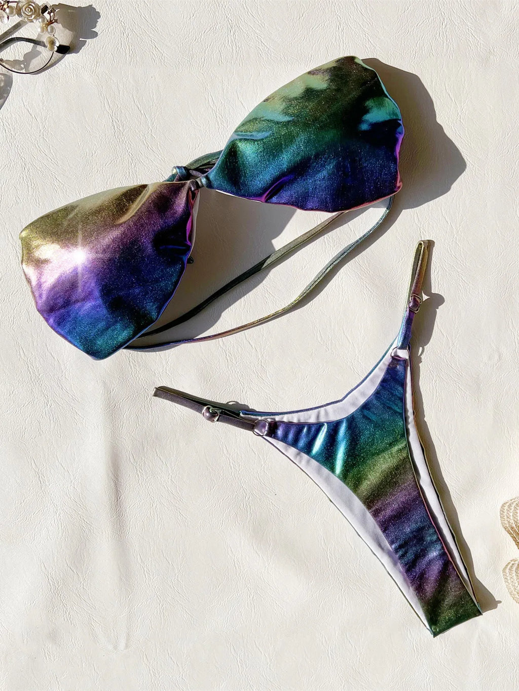 Women's gradient purple two-piece bikini swimsuit set on a mannequin.