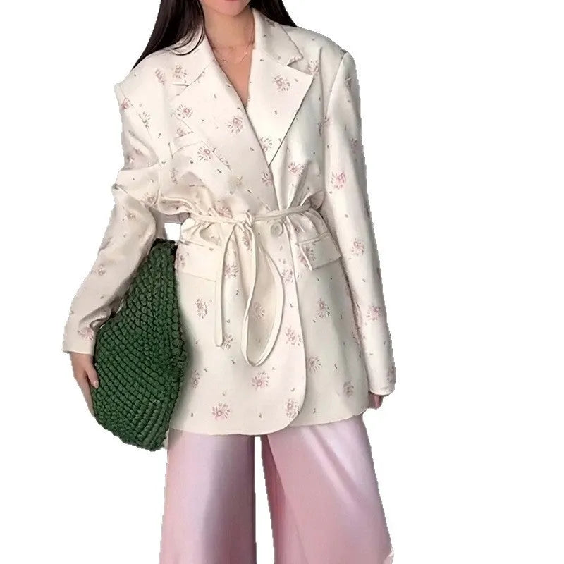 Women's collar lace-up waist-tight suit jacket in polyester, shown in apricot colour on a model.