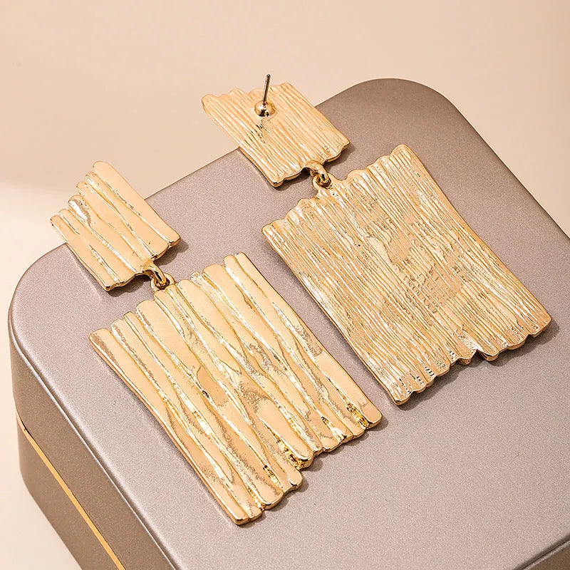 Gold geometric vertical stripe drop earrings for women made from zinc alloy