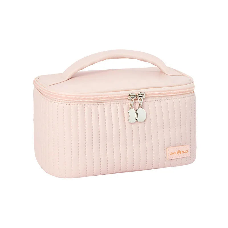Open-top round women's makeup bag in solid colour PU leather.