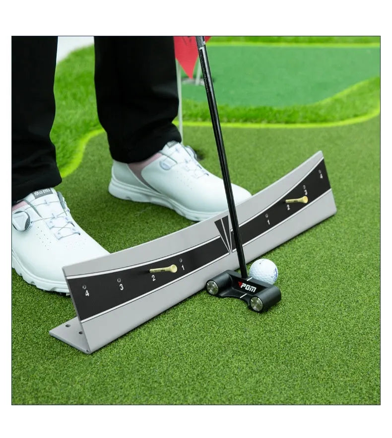 Golf putter resting against the adjustable PVC push rod balancer of the trajectory balance simulator on a carpet.