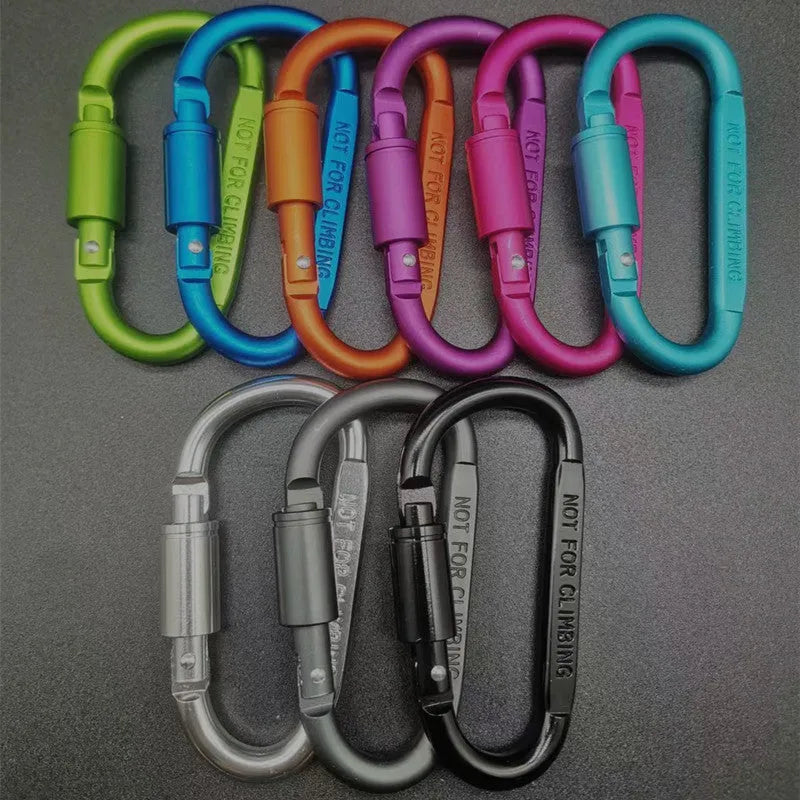 D-type aluminium locking carabiner in a selection of ten colours on a grey background.