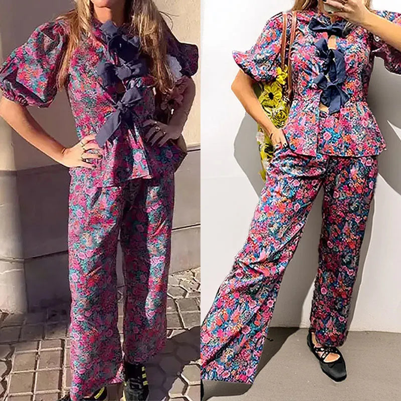 Women's floral print trousers suit with puff sleeves and tie-neck design in picture colour