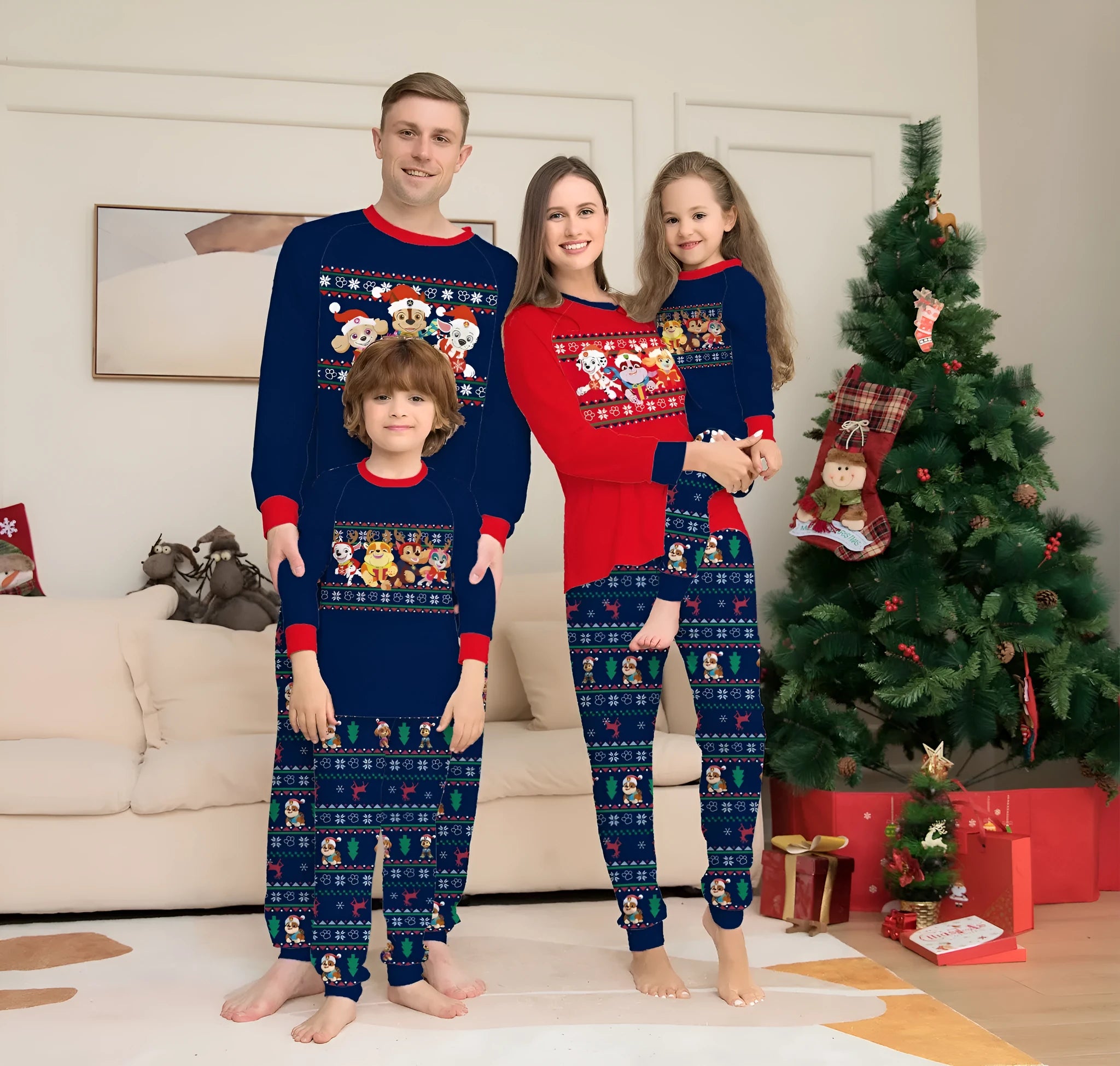 Matching red plaid Christmas pyjamas with cartoon deer print for men, women, kids, and dogs on a mannequin.