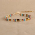 Geometric beaded bracelet with round glass and coloured glaze beads in five colour options.