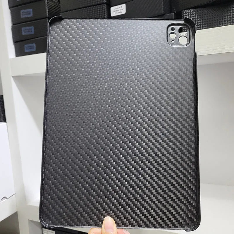 Real carbon fibre hard protective flat case for Apple iPad Pro 11 with an embossed plaid pattern.