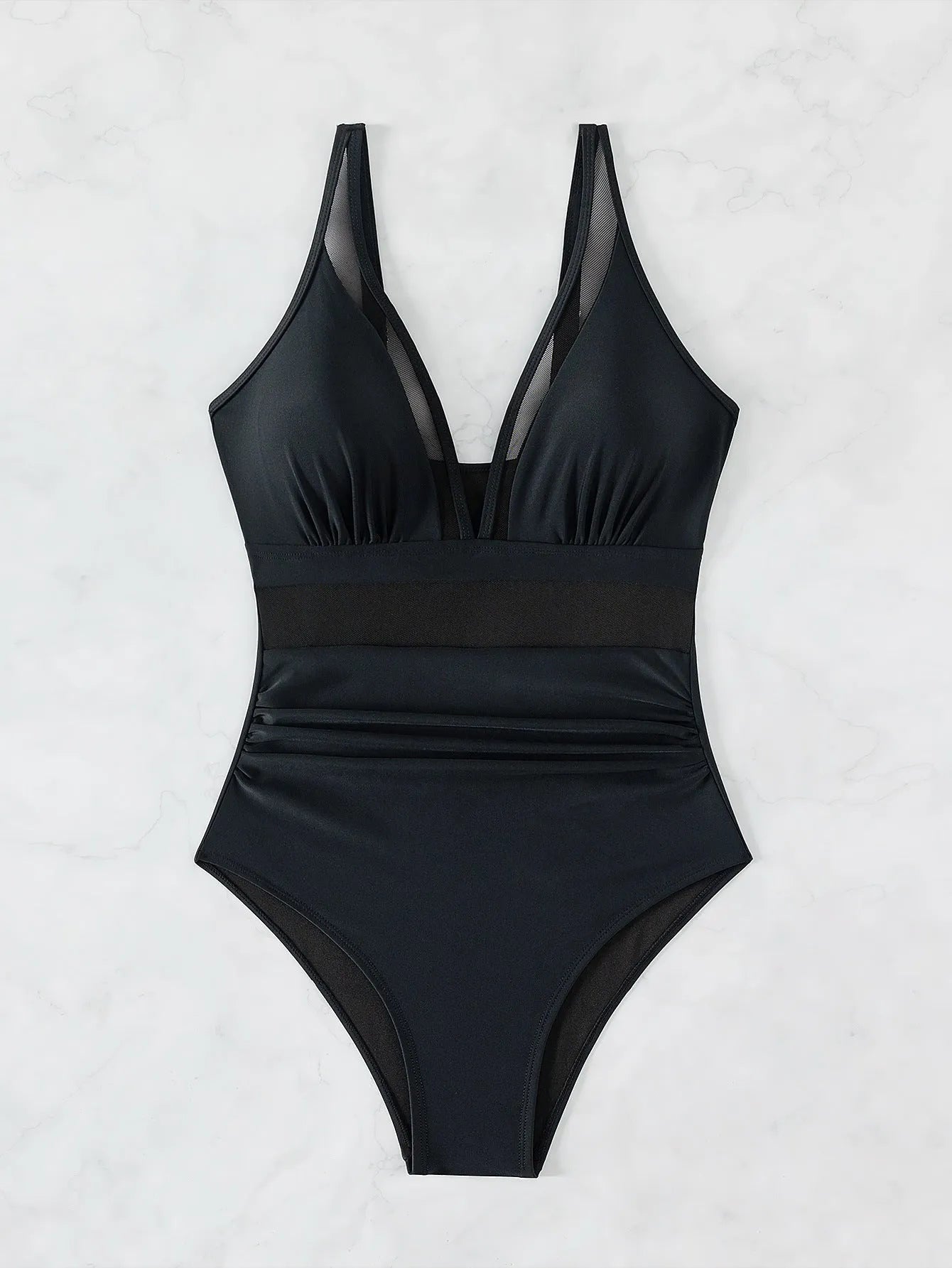 Black women's one-piece swimsuit with halter neck and briefs style, made from nylon fabric