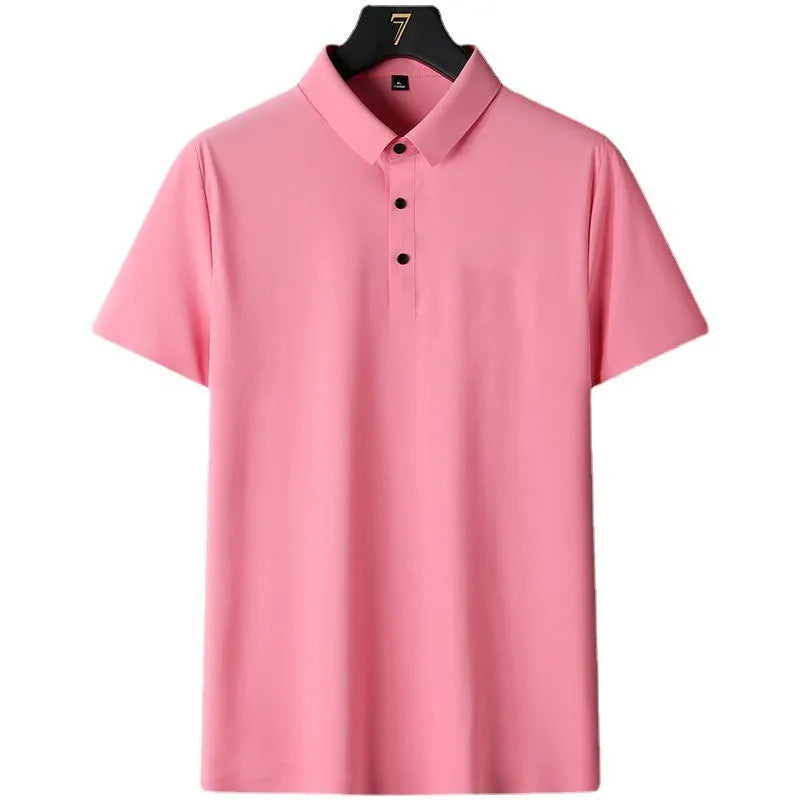 Man wearing a solid colour short sleeve non-ironing business casual shirt in a neutral tone.