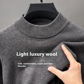 Men's solid colour fine yarn half turtleneck long sleeve pullover sweater on a hanger.