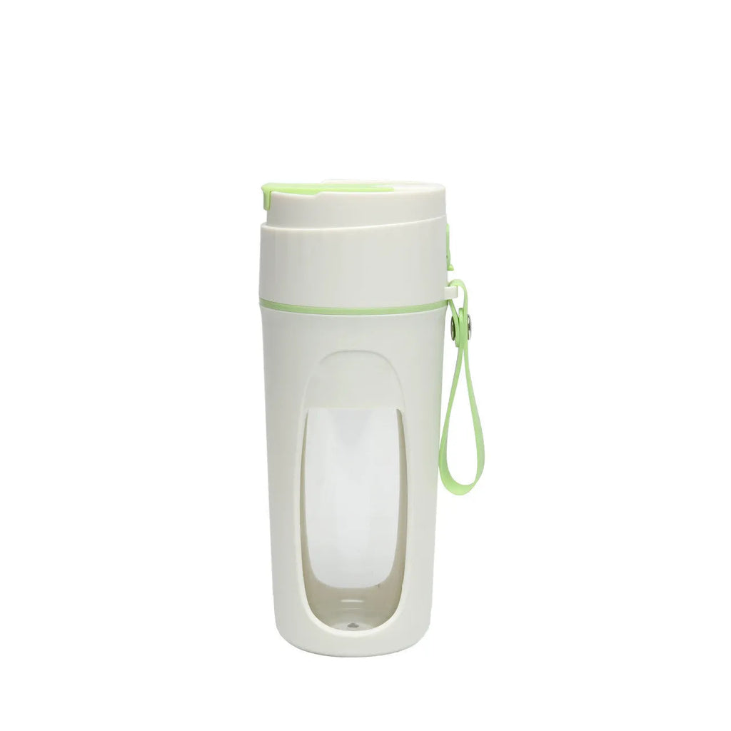 Portable USB electric blender with borosilicate glass cup in fresh orange, grass green, and light purple colours.