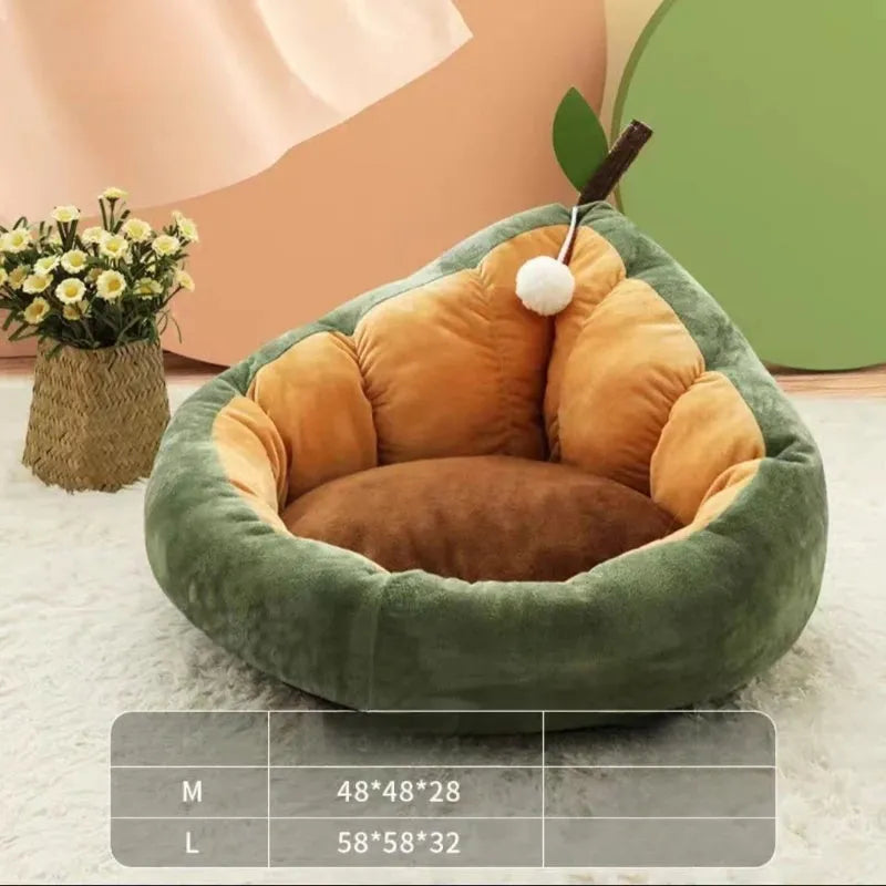 Green cotton pet bed with a plush raised rim for a cat or small dog.