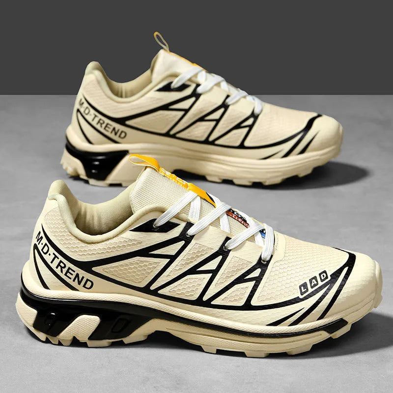 Men's and women's low-top outdoor hiking shoes in khaki with lace-up front and rubber sole.