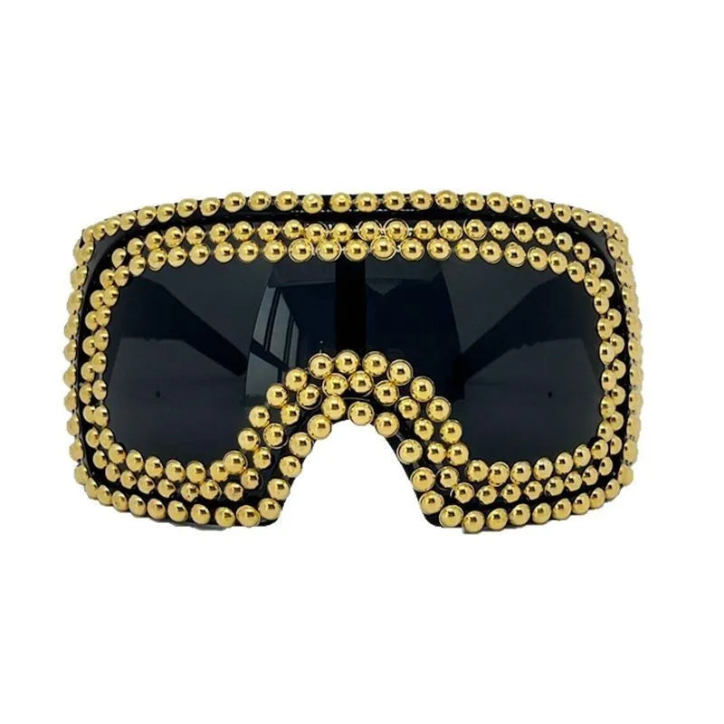Men's silver punk sunglasses with large square frames and rivet details on the temples