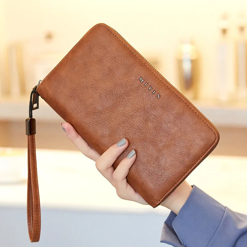 Anti-theft retro oil wax handbag in horizontal square shape with sewing thread details