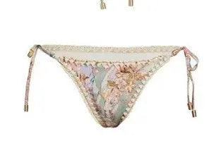 Women's creamy-white floral bikini suit with skirt for beach vacations