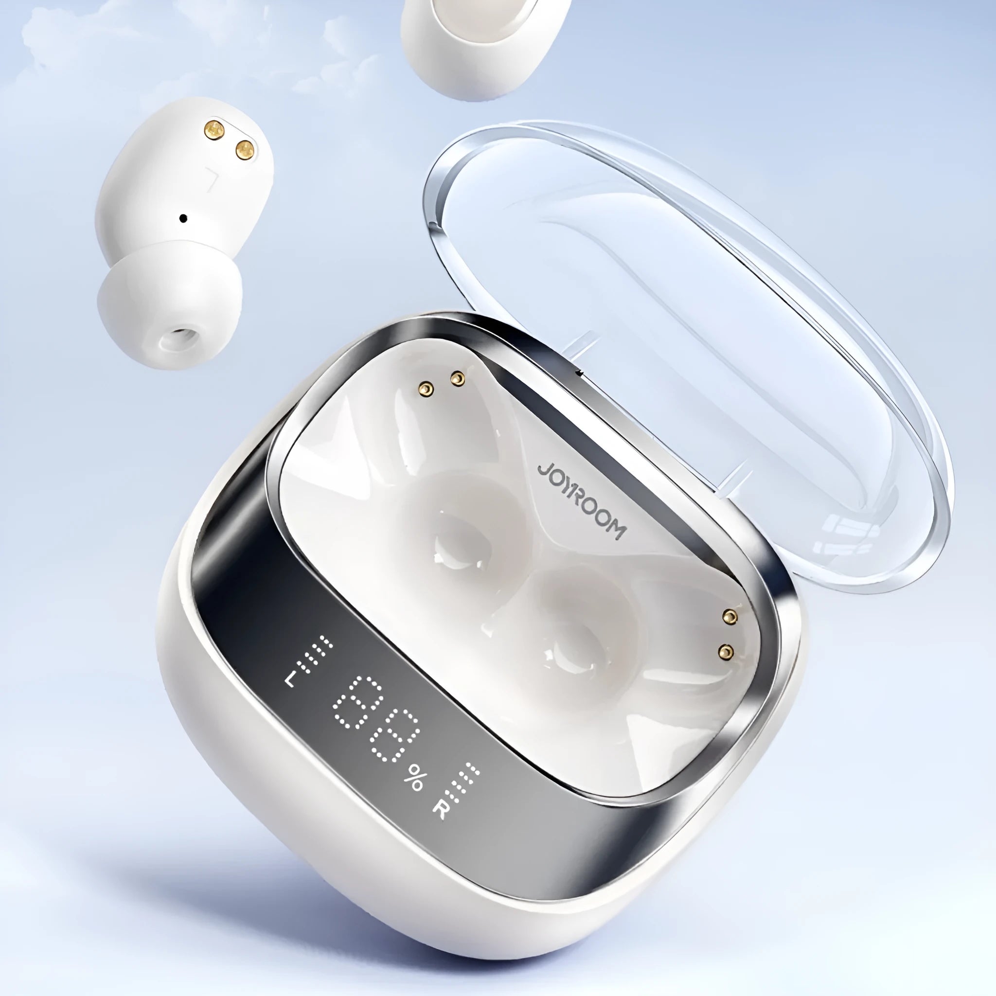 Beige wireless in-ear Bluetooth earbuds with a matching open charging case on a table.