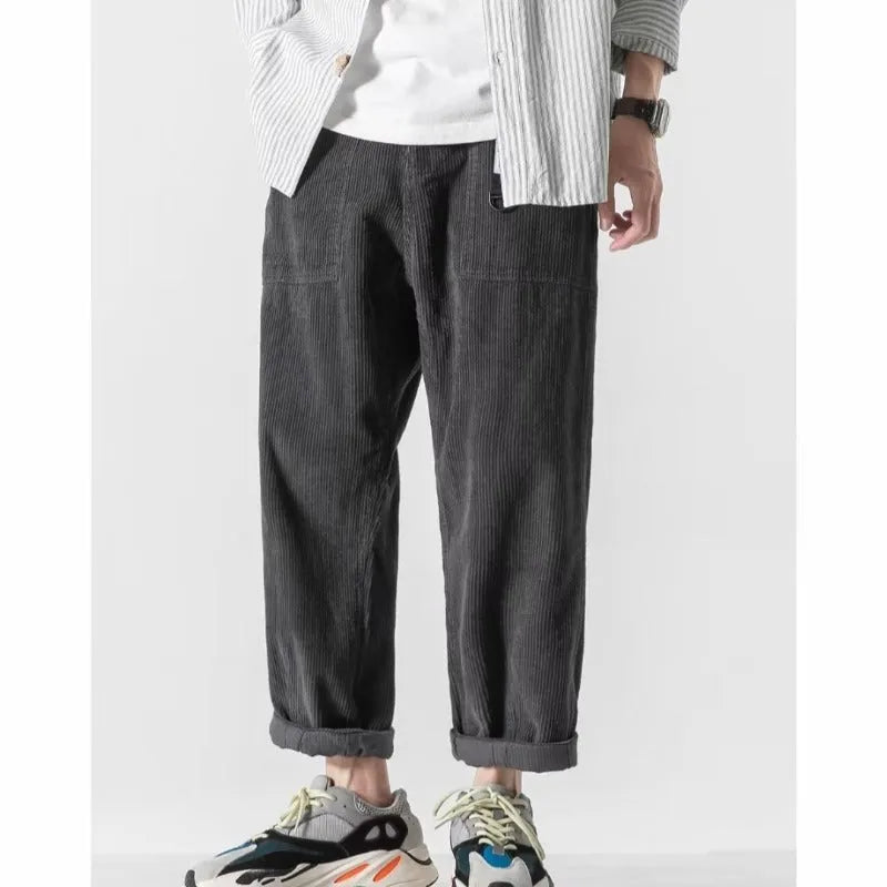 Loose straight tapered pants with wide legs in chemical fibre blend fabric, shown in dark grey colour