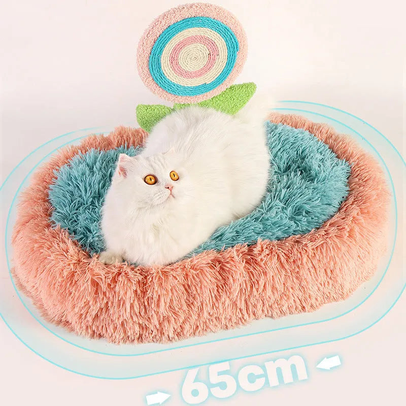 Pink elliptical lollipop-shaped plush cat bed with a removable cover.