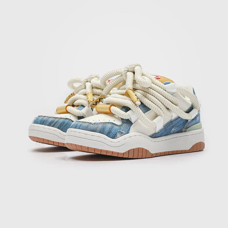 Unisex lace-up casual shoes with a thick rubber sole and mesh lining in denim blue.