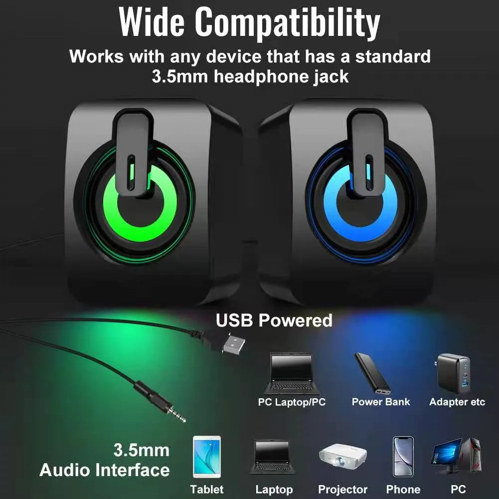 A pair of black plastic USB mini multimedia speakers with wired connection