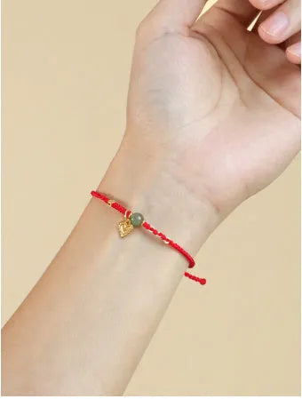 Handmade woven women's bracelet with 925 silver and red Hetian jade
