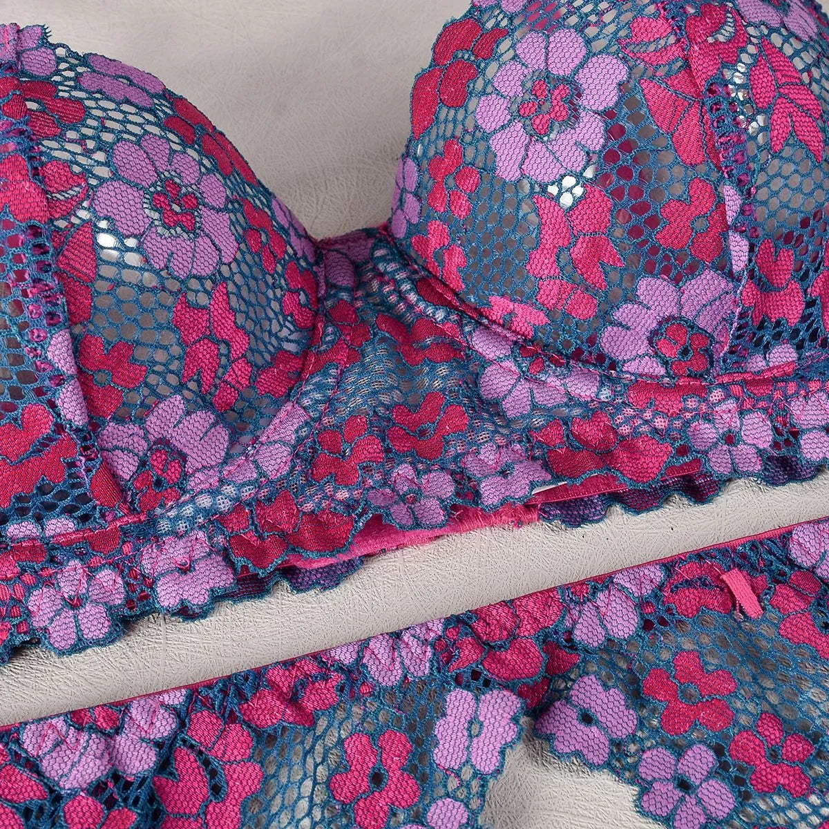 Rose red women's embroidered bikini set with contrast colour details on polyester fabric