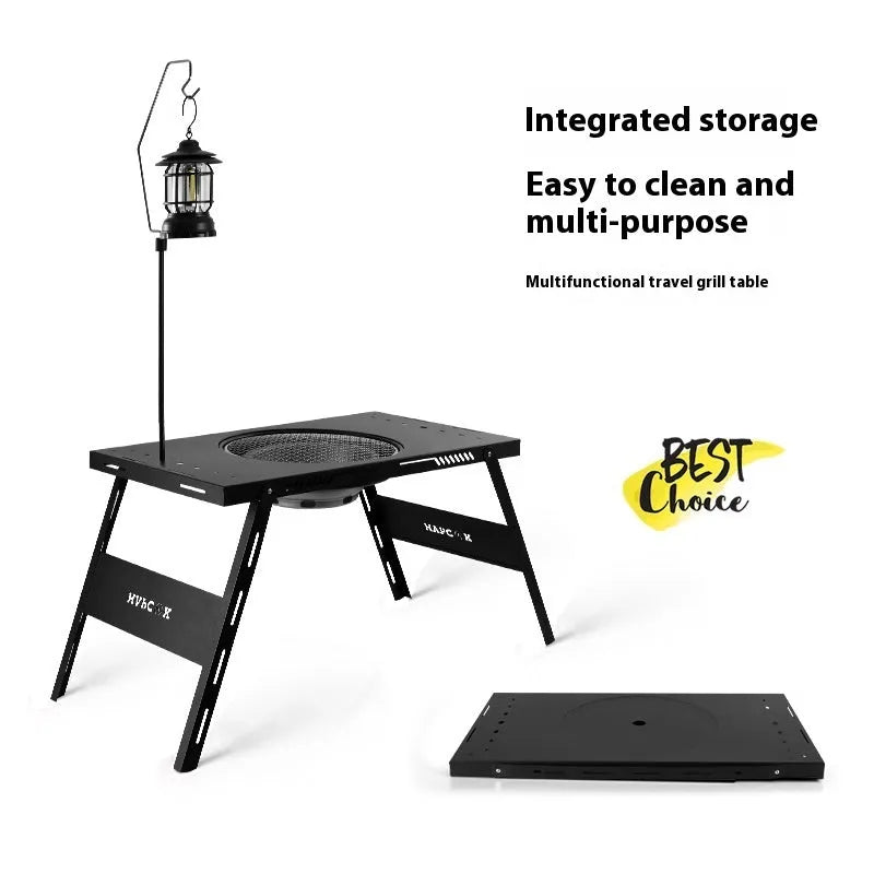 Folding camping cooking table with integrated barbecue surface in black