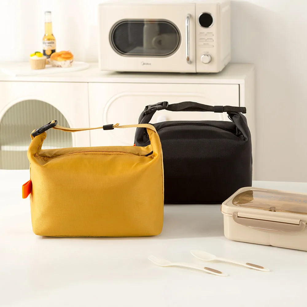 Japanese style insulated bag in army green Oxford cloth showing wide opening.