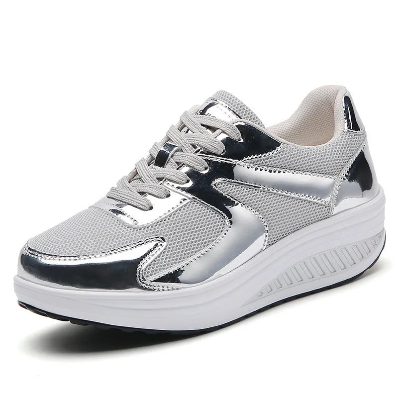 Women's gold mesh platform trainers with cross-strap design and waterproof thick sole