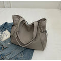 Foldable Oxford cloth commuter tote bag in street trend style, shown in multiple colour options.